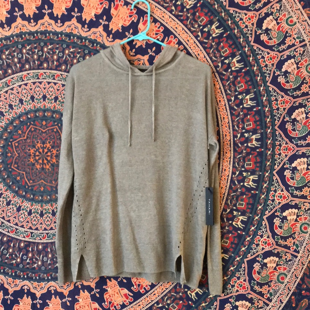 Sweater. Never worn. Tags attached.